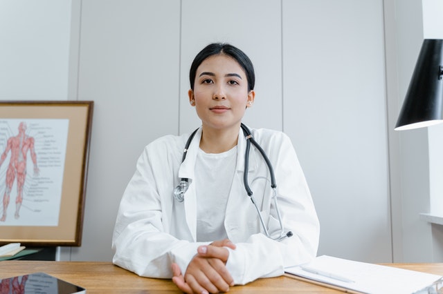 female doctor waiting for her telemedicine appointment to begin in zoom app